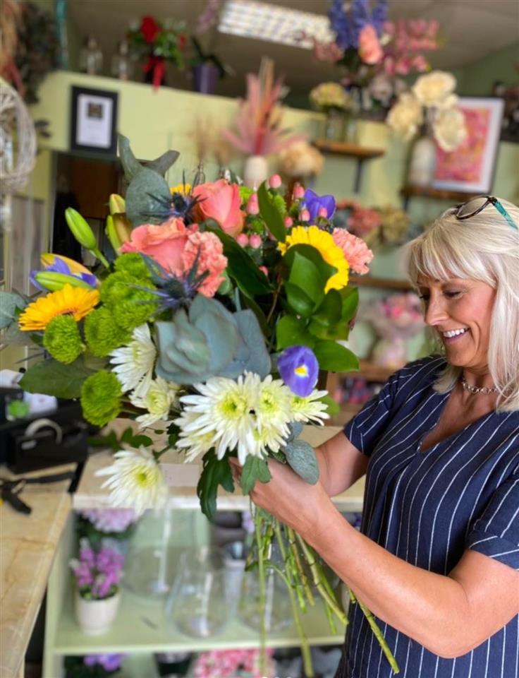 About Robbie and Nicoll Florist